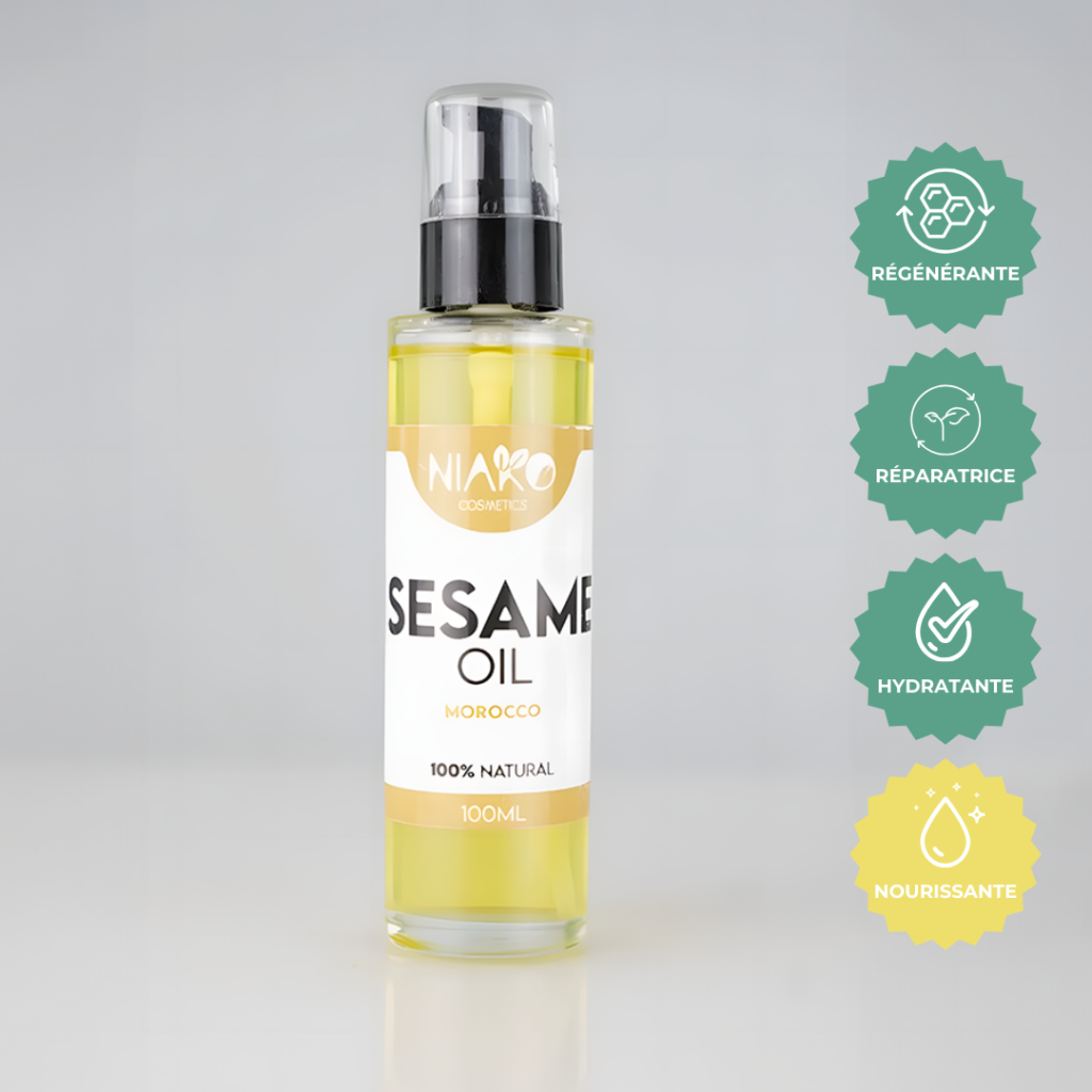 Bouteille d'huile de sésame 100% naturelle de 100ml de NIARO Cosmetics avec étiquettes indiquant origine marocaine et bienfaits régénérants, réparateurs, hydratants et nourrissants.